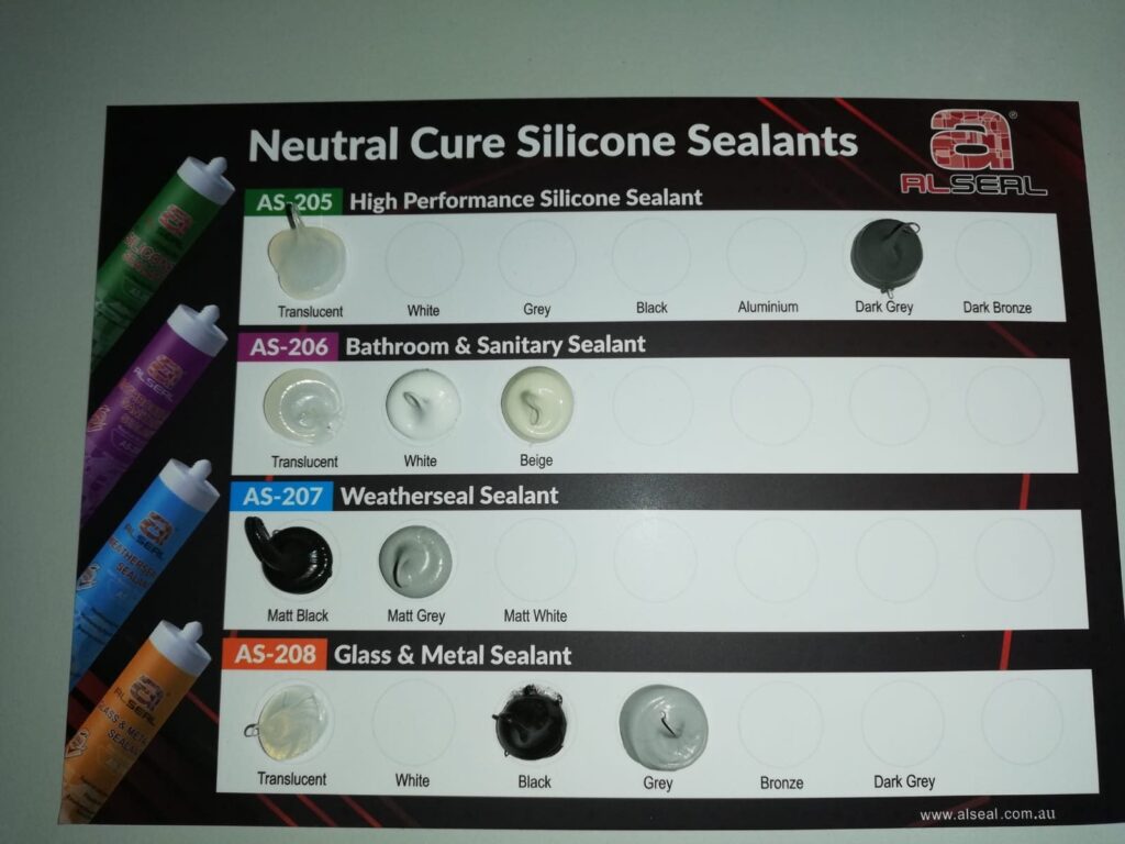 Close-up of a label featuring various silicone sealant products, including AS-205, AS-206, AS-207, and AS-208. The label includes descriptions such as "High Performance Silicone Sealant," "Bathroom & Sanitary Sealant," and "Weatherseal Sealant," with color options listed like Translucent Grey, Dark Bronze, and Matt White. The website www.alseal.com.au is also present on the label.